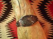 BELL Stamp & Concho Repousse Silver Cuff  c.1940