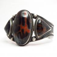 Antique 卍 Stamped Cuff Bracelet w/Three PetrifiedWood c.1930